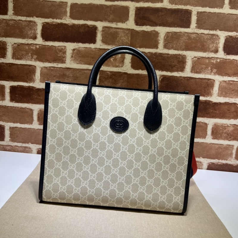 G*u*i shopping bags